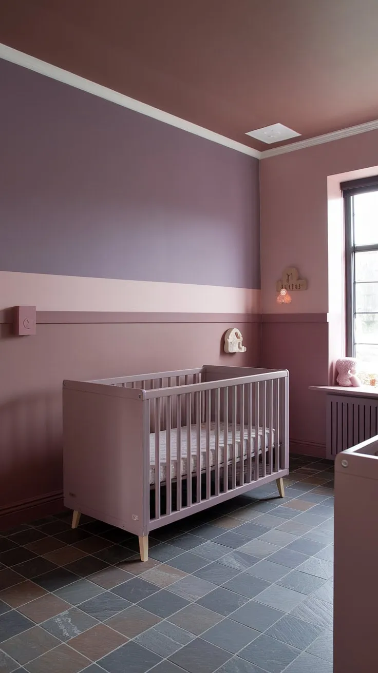 A light brown accent wall nursery detail elevates this neutral purple nursery, showcasing a sophisticated nursery decor accent wall in a calming Sashay Sand Sherwin Williams palette.  The taupe and pink nursery scheme is beautifully balanced with grey and mauve nursery elements, and the crib on window wall creates a peaceful space.  Cinnamon slate nursery tiles ground the mauve and brown nursery, resulting in a stylish and functional girl nursery room wall.