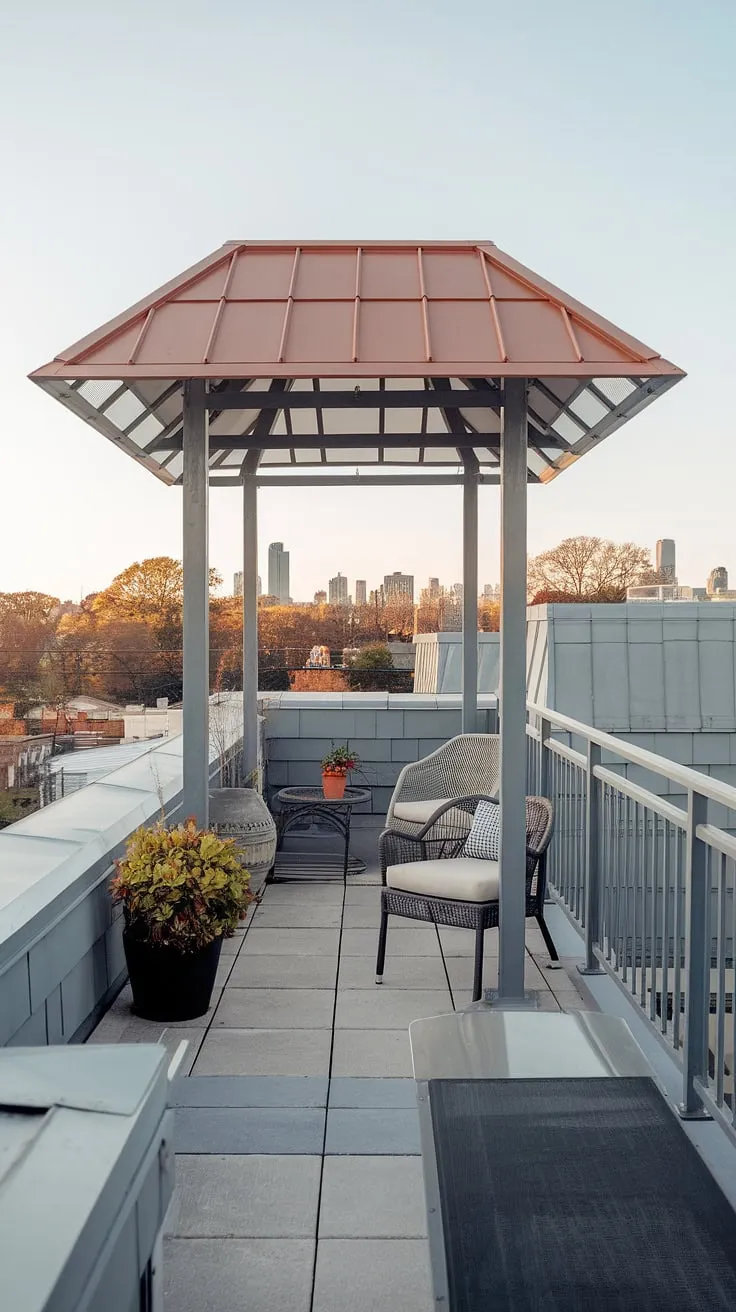 This small rooftop terrace, complete with a balcony roof, offers a tranquil escape from the bustling city below. The simple setup, incorporating clever rooftop garden design elements like the potted plant, showcases how even a small space can be transformed into a charming urban rooftop deck. Plenty of rooftop patio ideas and small terrace ideas are on display here, proving that maximizing a small rooftop terrace is entirely achievable.