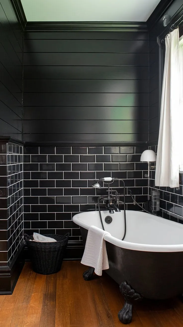 Dark elegance redefined: Black bathroom wainscoting and shiplap create a dramatic backdrop for this clawfoot tub, showcasing stunning black bathroom decor ideas in a black and wood bathroom. Black tile bathrooms never looked so luxurious.