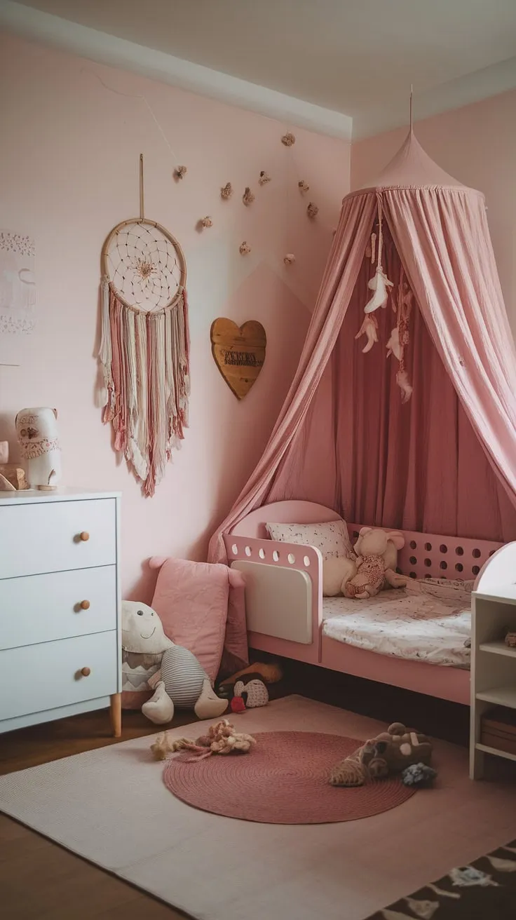 Dive into a world of bohemian bliss with this dreamy pink boho toddler room.  Find inspiration for your own toddler room ideas girl boho with this perfectly curated space.  This simple toddler room girl is packed with kids room inspo girl, showcasing the effortless chic of a boho girls room and boho bedroom kids girl.  Let this boho kids bedroom girl inspire your toddler room themes girl and create a pink boho toddler room your little one will adore.