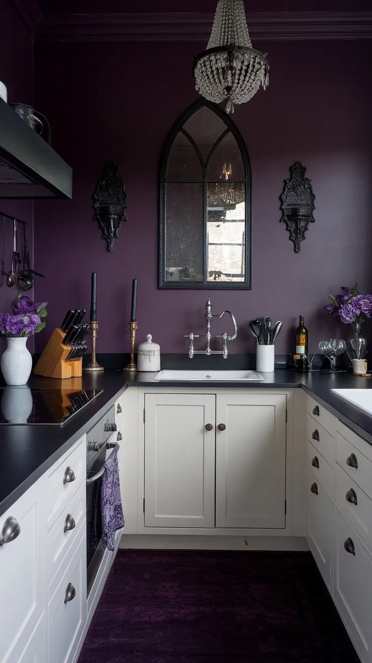 Dark purple walls and a gothic mirror create an atmosphere of mysterious elegance in this feminine kitchen; the white cabinets offer a striking contrast against the black countertops, while the vintage chandelier adds a touch of old-world charm. A perfect blend of darkness and light.
