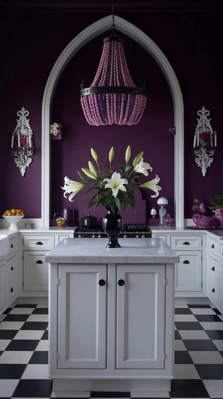 Dark romance meets culinary artistry in this gothic kitchen. The stark white cabinetry and marble countertops are beautifully offset by the deep purple hues and dramatic chandelier, creating a space where elegance and mystery intertwine. A single bouquet of white lilies adds a touch of ethereal beauty.