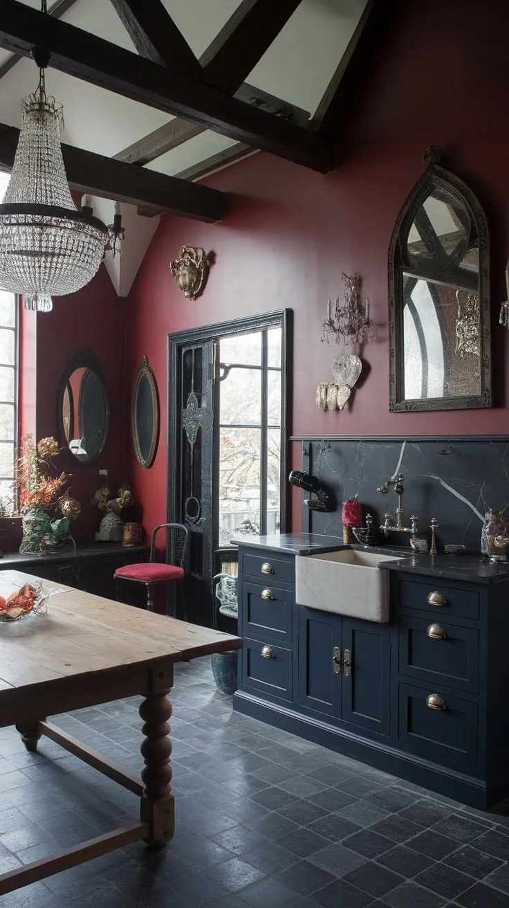 Crimson walls whisper secrets in this gothic kitchen, where antique mirrors reflect the flickering candlelight of a grand chandelier, casting an alluring glow on the dark marble countertops and deep blue cabinetry. A testament to darkly feminine design, it's a space where history and elegance intertwine. A sense of mystery hangs heavy in the air, a captivating blend of old-world charm and modern sophistication.