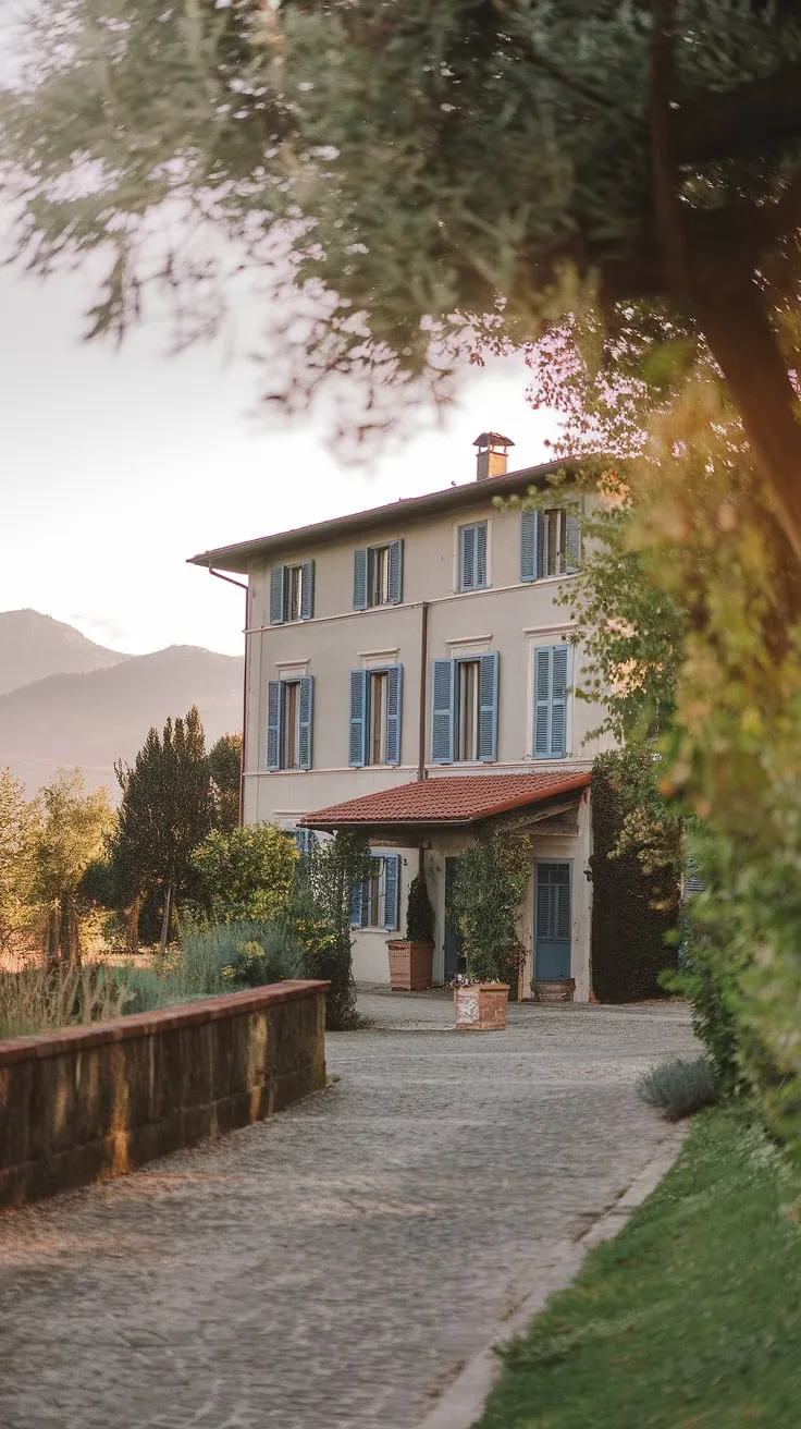Northern Italy's idyllic villa, with its red roof and blue shutters, evokes a charming European summer escape