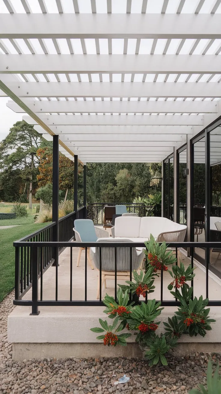 This patio is a dream. The clean lines of the mid-century modern design, the contrasting black and white, and the vibrant greenery create a stunning outdoor space. A feeling of effortless elegance pervades, inviting you to unwind and soak in the peaceful atmosphere. The pebble ground adds a textural element that completes the look.