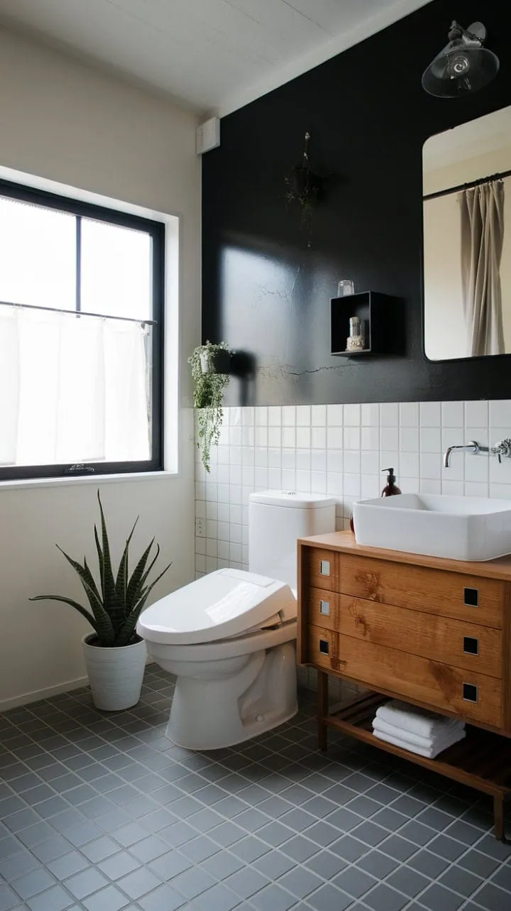 This Japandi-inspired bathroom harmoniously fuses Japanese minimalism with Scandinavian functionality, creating a serene sanctuary of clean lines and natural warmth.