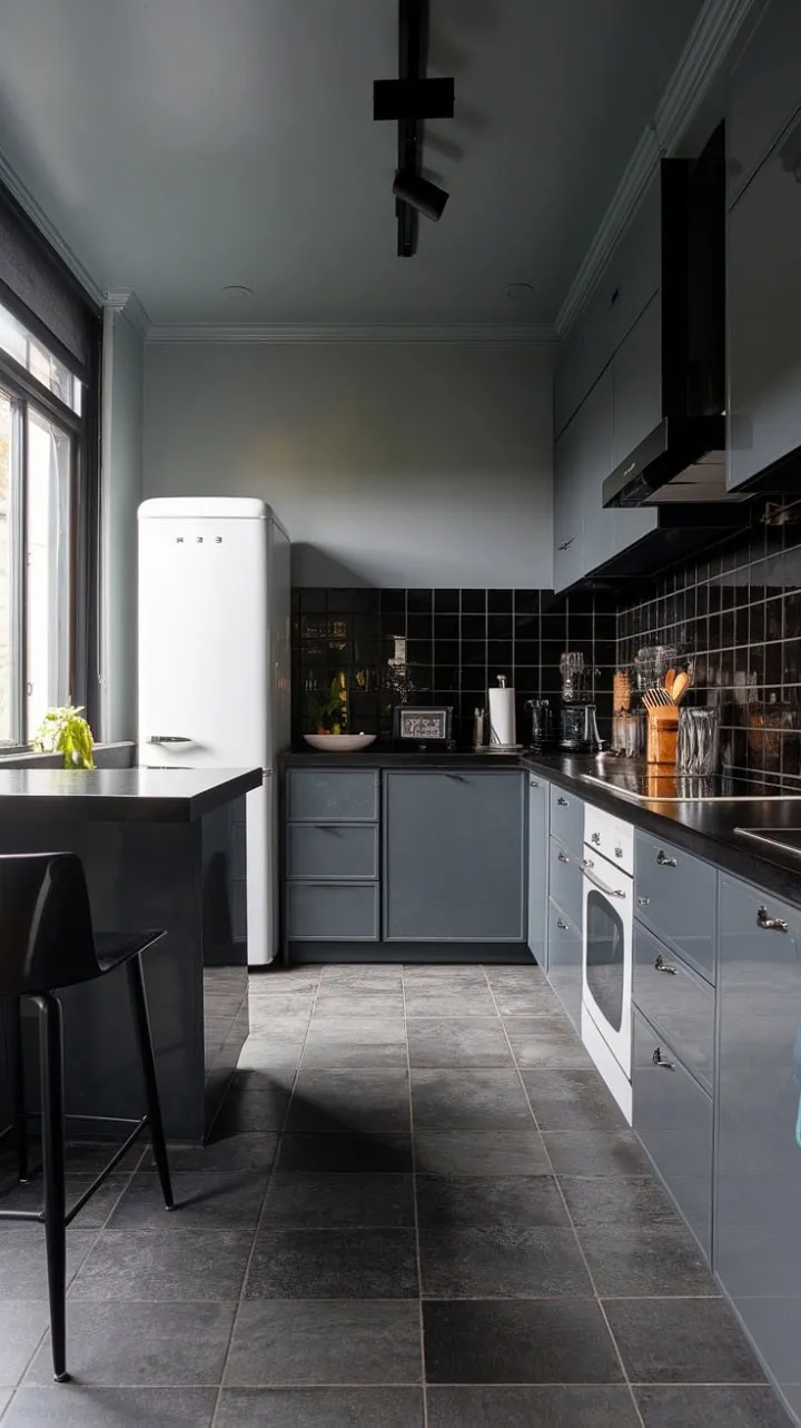 This modern kitchen masterfully combines sleek grey cabinetry, black countertops, and white appliances, all illuminated by natural light to create a stylish yet functional culinary haven.