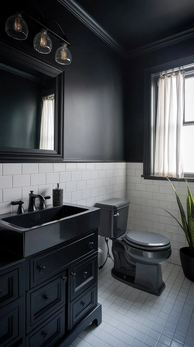 The dark tiny bathroom exudes sophistication with its moody half bath design, highlighted by black fixtures and a grey toilet, creating an inviting yet dramatic atmosphere.