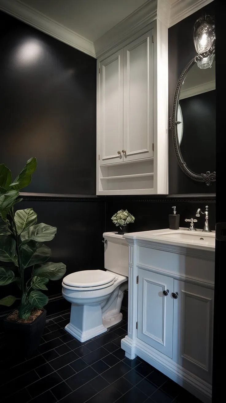 The moody bathroom showcases a chic black powder room design, blending dark tiles and white fixtures for a luxurious and inviting powder room decor.