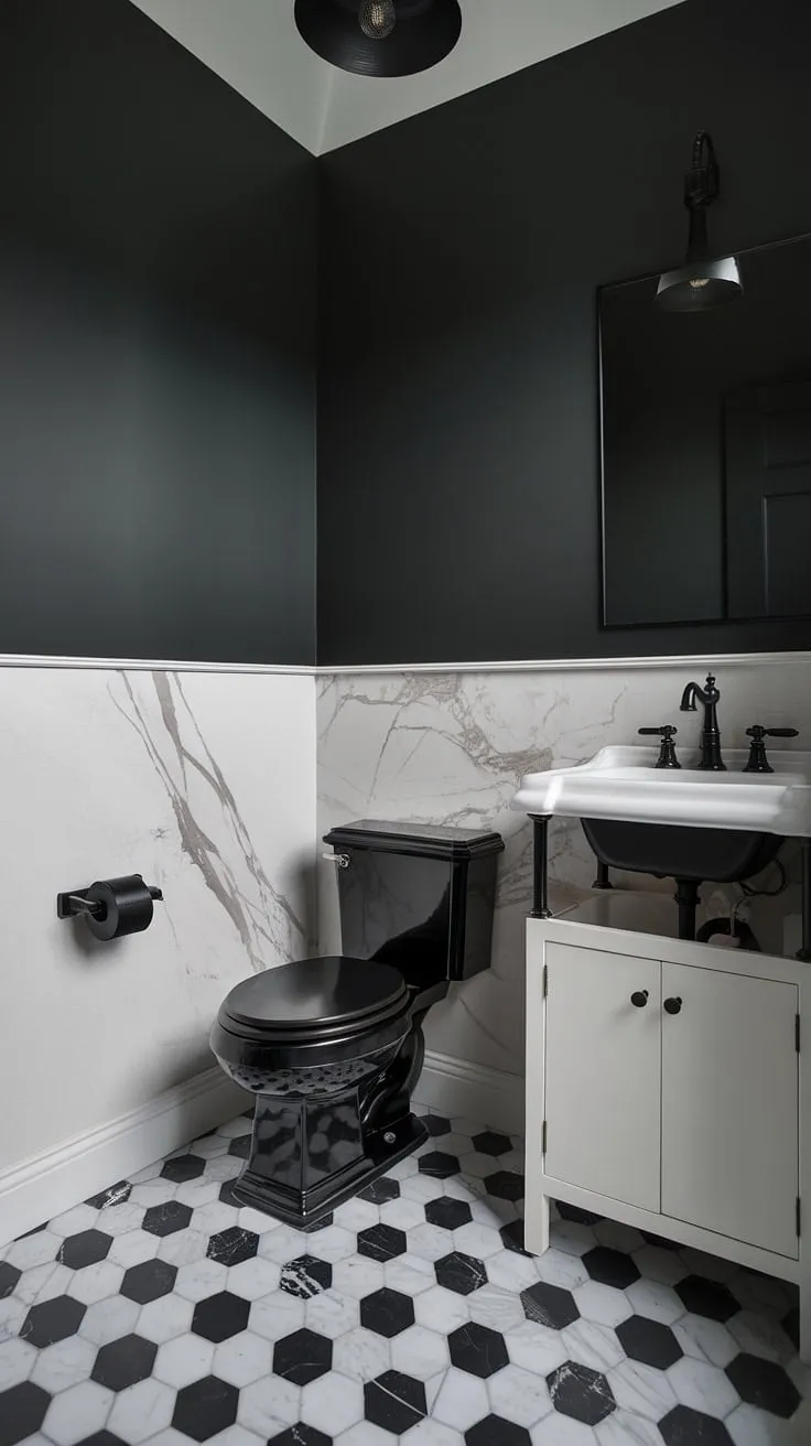 This luxurious moody powder room features a striking black and white marble floor, a sleek black toilet, and a dark grey hue that enhances its elegant powder bathroom decor.