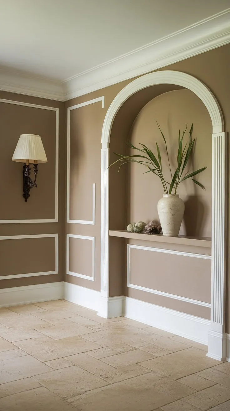This traditional entryway showcases the perfect blend of style and serenity. Hallway ideas abound in this house design entryway, from the beige home decor ideas to the clean entryway decor. The hallway flooring ideas and hallway wall ideas contribute to a truly elegant hallway design.