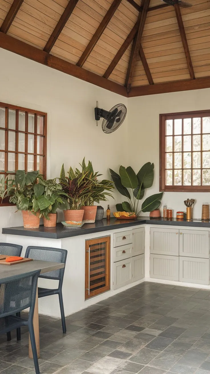 Modern tropical kitchen design blends white cabinets, dark countertops, and wooden accents for a stylish space