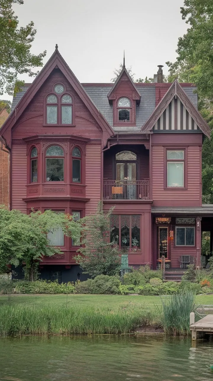 This striking crimson gem artfully fuses Victorian charm with contemporary luxury, showcasing exquisite stained-glass windows and a tranquil lakeside garden.